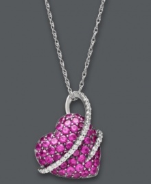 Everyone wants to be in love. Embrace it with this heart-shaped stunner. Crafted in sterling silver, round-cut rubies (2-1/2 ct. t.w.) and swirls of round-cut diamonds (1/5 ct. t.w.) create a magical look. Approximate length: 18 inches. Approximate drop: 3/4 inch. Everyone wants to be in love. Embrace it with this heart-shaped stunner. Crafted in sterling silver, round-cut rubies (2-1/2 ct. t.w.) and swirls of round-cut diamonds (1/5 ct. t.w.) create a magical look. Approximate length: 18 inches. Approximate drop: 3/4 inch.