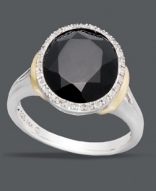 A statement-making style adds instant dimension to your look. Crafted in sterling silver with 14k gold accents at the sides, this bold ring highlights a round-cut onyx center stone (3-5/8 ct. t.w.) encircled by sparkling diamonds (1/10 ct. t.w.). Size 7.