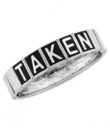 Tell your many admirers that you're off the market. BCBGeneration's trendy stretch bracelet features the word TAKEN in black enamel stenciling. Set in silver tone mixed metal. Bracelet stretches to fit wrist. Approximate diameter: 3-1/2 inches. Tell your many admirers that you're off the market. BCBGeneration's trendy stretch bracelet features the word TAKEN in black enamel stenciling. Set in silver tone mixed metal. Bracelet stretches to fit wrist. Approximate diameter: 3-1/2 inches.