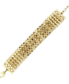 Glam up your look in BCBGeneration's gilded style. A unique blend of smooth and burnished links in gold tone mixed metal create a vintage aesthetic. Approximate length: 8 inches.