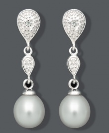 The perfect pair for the sophisticated woman. These elegant drops highlight cultured freshwater pearls (7-8 mm) and a double teardrop design accented by sparkling diamonds. Crafted in sterling silver. Approximate drop: 1 inch.