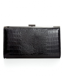 Explore the exotic in evening accessorizing with this posh, croc-embossed bag from BCBGMAXAZRIA. Signature hardware and slim shoulder strap add instant elegance, while the interior discretely stows phone, cash, cards and lipstick. Explore the exotic in evening accessorizing with this posh, croc-embossed bag from BCBGMAXAZRIA. Signature hardware and slim shoulder strap add instant elegance, while the interior discretely stows phone, cash, cards and lipstick.
