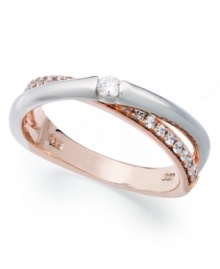 Sparkle and shine combine on this pretty overlap ring. Crafted in sterling silver and 14k rose gold with sparkling round-cut cubic zirconias (1/6 ct. t.w.). Size 7. Sparkle and shine combine on this pretty overlap ring. Crafted in sterling silver and 14k rose gold with sparkling round-cut cubic zirconias (1/6 ct. t.w.). Size 7.