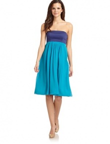 THE LOOKColorblock designStrapless with bust darts Empire waist with gathered detailsSide zip closureTHE FITAbout 30 from top to hemTHE MATERIALBodice: 98% cotton/2% lycraSkirt: SilkPartially linedCARE & ORIGINDry cleanImportedModel shown is 5'10 (177cm) wearing US size 4. THE LOOKColorblock designStrapless with bust darts Empire waist with gathered detailsSide zip closureTHE FITAbout 30 from top to hemTHE MATERIALBodice: 98% cotton/2% lycraSkirt: SilkPartially linedCARE & ORIGINDry cleanImportedModel shown is 5'10 (177cm) wearing US size 4.