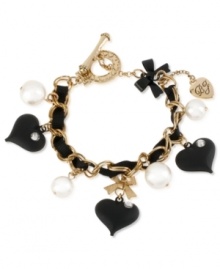 Have a heart, or three. Betsey Johnson's bracelet is crafted from gold-tone mixed metal with a black grosgrain ribbon. Glass pearls and crystal accents shine through. Approximate length: 7-1/2 inches.