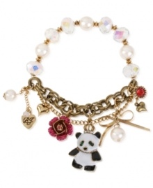 Cuddly chic. This multi-charm half stretch bracelet from Betsey Johnson is crafted from antique gold-tone metal with glass pearls and accents. The adorable charms set it apart, giving it a stylish touch with a bit of whimsy. Item comes packaged in a signature Betsey Johnson Gift Box. Approximate length: 7-1/2 inches.