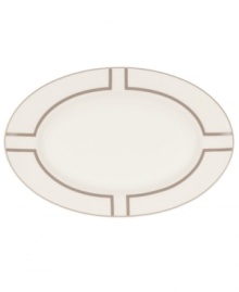Metallic bronze lines create the sleek geometric pattern framing this glossy butter/relish tray from Noritake serveware. Crafted in durable bone china and trimmed with platinum for fine dining or everyday use. Metallic bronze lines create the sleek geometric pattern framing this glossy butter/relish tray from Noritake serveware. Crafted in durable bone china and trimmed with platinum for fine dining or everyday use.