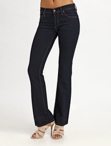Stretch denim in a modern dark wash with a subtle sheen, has four-pocket styling and contrast stitching.Narrow waistband with belt loops and button closure Front zipperFour-pocket style Inseam, about 3165% cotton/32% polyester/3% LycraMachine wash Made in USA