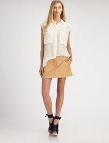 Semi-sheer, menswear-inspired silk top with slightly distressed armholes and two oversized patch pockets. Point collarSleevelessLonger length hits below the hipsSilkDry cleanImportedModel shown is 5'10 (177cm) wearing US size 4. Semi-sheer, menswear-inspired silk top with slightly distressed armholes and two oversized patch pockets. Point collarSleevelessLonger length hits below the hipsSilkDry cleanImportedModel shown is 5'10 (177cm) wearing US size 4.