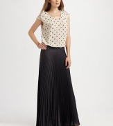 Pretty ikat hearts highlight this breezy silk topper.Raw-edge jewel necklineRuched shouldersCap sleevesBack keyhole closureHem is longer in backAbout 28 from shoulder to hemSilkDry cleanImportedOUR FIT MODEL RECOMMENDS ordering true size. 