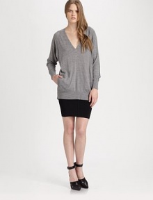 Ultra-light wool in a slouchy-chic silhouette with a plunging v-neck, long dolman sleeves and slash pockets. V-neckLong dolman sleevesSlash pocketsLonger length hits below the hipsWoolDry cleanImported of Italian fabricModel shown is 5'10 (177cm) wearing US size Small.