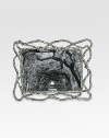 The asymmetric twists and turns of natural vines are recreated by one of America's premier metalwork artists in hand-sculpted, nickel-plated metal. From the Wisteria CollectionOverall, 8¼ X 6¼Accommodates a 4 X 6 photographHand washImported 