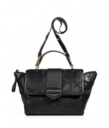 Enjoy the elegant look of an exclusive combination of materials in this black cowhide and lamb leather bag - Designed in an trendy, functional shopper shape - Features a large flap and top zipper closure, short top handle and long, adjustable shoulder strap - Great bag for the office or around town Enjoy the elegant look of an exclusive combination of materials in this black cowhide and lamb leather bag - Designed in an trendy, functional shopper shape - Features a large flap and top zipper closure, short top handle and long, adjustable shoulder strap - Great bag for the office or around town