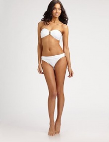 Sexy bandeau top with dazzling gold center for a beach ready look. Padded bandeau topBack tie closureFully lined75% polyamide/25% spandexHand washImported Please note: Bikini bottom sold separately. Sexy bandeau top with dazzling gold center for a beach ready look. Padded bandeau topBack tie closureFully lined75% polyamide/25% spandexHand washImported Please note: Bikini bottom sold separately.