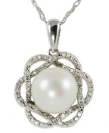 Elegance is always in season, just like this sterling silver necklace which features a cultured freshwater pearl (9-10 mm) and round-cut diamond (1/10 ct. t.w.) flower pendant. Approximate length: 18 inches. Approximate drop length: 7/8 inch. Approximate drop width: 5/8 inch. Elegance is always in season, just like this sterling silver necklace which features a cultured freshwater pearl (9-10 mm) and round-cut diamond (1/10 ct. t.w.) flower pendant. Approximate length: 18 inches. Approximate drop length: 7/8 inch. Approximate drop width: 5/8 inch.