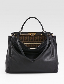Fine Italian leather with a structured silhouette and a detachable shoulder strap. Top handle, 5 dropDetachable shoulder strap, 12½ dropTurnlock closureMetal feetTwo inner compartmentsOne inside zip pocketOne inside open pocketFully lined15W X 13H X 7DMade in Italy Fine Italian leather with a structured silhouette and a detachable shoulder strap. Top handle, 5 dropDetachable shoulder strap, 12½ dropTurnlock closureMetal feetTwo inner compartmentsOne inside zip pocketOne inside open pocketFully lined15W X 13H X 7DMade in Italy