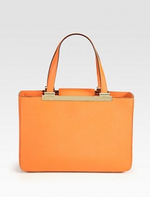 This structured lady-like carryall imparts thoughts of spring's new minimalism in ultra-rich Saffiano leather. Double top handles, 7½ dropMagnetic snap closureProtective metal feetOne inner zip compartmentOne inside zip pocketFour inside open pocketsLogo-printed lining13¼W X 9H X 4½DImported This structured lady-like carryall imparts thoughts of spring's new minimalism in ultra-rich Saffiano leather. Double top handles, 7½ dropMagnetic snap closureProtective metal feetOne inner zip compartmentOne inside zip pocketFour inside open pocketsLogo-printed lining13¼W X 9H X 4½DImported