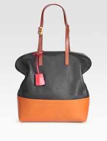 A slouchy and curvaceous carryall reimagined with modern color blocking, in an array of smooth and pebbled leathers.Adjustable shoulder straps, 7-9½ drop Top zip closure Two inside open pockets Center zip compartment Linen lining 12W X 13½H X 5D Made in Italy A slouchy and curvaceous carryall reimagined with modern color blocking, in an array of smooth and pebbled leathers.Adjustable shoulder straps, 7-9½ drop Top zip closure Two inside open pockets Center zip compartment Linen lining 12W X 13½H X 5D Made in Italy