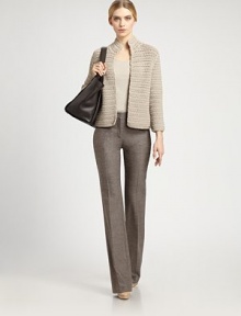 Richly textural hand-crocheted rows make up this lightweight knit silhouette.Mock neck collarOpen frontThree-quarter sleevesVented cuffsAbout 18 from shoulder to hem45% viscose/40% polyamide/15% woolDry cleanMade in SwitzerlandModel shown is 5'11 (180cm) wearing US size 4. Richly textural hand-crocheted rows make up this lightweight knit silhouette.Mock neck collarOpen frontThree-quarter sleevesVented cuffsAbout 18 from shoulder to hem45% viscose/40% polyamide/15% woolDry cleanMade in SwitzerlandModel shown is 5'11 (180cm) wearing US size 4.