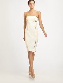 Luxe wool crepe, impeccably tailored and finished with striking, shiny gold leather piping.StraplessPrincess seamsMetallic leather pipingConcealed back zipBack ventAbout 24½ from natural waist99% wool/1% spandexDry cleanMade in ItalyModel shown is 5'11 (180cm) wearing US size 4.OUR FIT MODEL RECOMMENDS ordering true size. Luxe wool crepe, impeccably tailored and finished with striking, shiny gold leather piping.StraplessPrincess seamsMetallic leather pipingConcealed back zipBack ventAbout 24½ from natural waist99% wool/1% spandexDry cleanMade in ItalyModel shown is 5'11 (180cm) wearing US size 4.OUR FIT MODEL RECOMMENDS ordering true size.