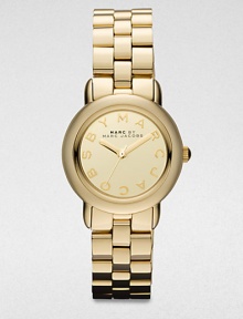 A radiant goldtone ion-plated stainless steel timepiece with logo markers. Quartz movementWater resistant to 5 ATMRound goldtone ion-plated stainless steel case, 27.5mm (1)Smooth bezelGoldtone mirror dialLogo hour markersSecond hand Goldtone stainless steel link braceletImported A radiant goldtone ion-plated stainless steel timepiece with logo markers. Quartz movementWater resistant to 5 ATMRound goldtone ion-plated stainless steel case, 27.5mm (1)Smooth bezelGoldtone mirror dialLogo hour markersSecond hand Goldtone stainless steel link braceletImported
