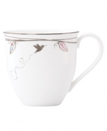 Hummingbirds twirl and buzz from flowery pink leaves to blue on this dreamy bone china mug from Lenox Lifestyle dinnerware. The dishes from the Silver Song collection are crisscrossed with platinum branches and abound with fanciful springtime delight and irresistible modern charm. Qualifies for Rebate