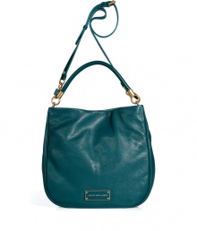 The classic hobo gets a modern redux with this supple leather version from Marc by Marc Jacobs - Classic hobo shape, magnet closure, top carrying handle, convertible shoulder strap, front logo plaque - Wear with an elevated jeans-and-tee ensemble or with a casual cocktail look The classic hobo gets a modern redux with this supple leather version from Marc by Marc Jacobs - Classic hobo shape, magnet closure, top carrying handle, convertible shoulder strap, front logo plaque - Wear with an elevated jeans-and-tee ensemble or with a casual cocktail look