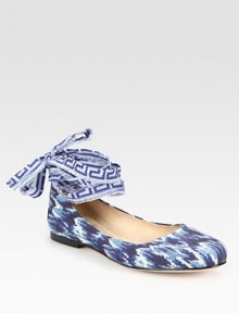 Comfortable linen flat in a trend-smart ikat print with a tie that makes its way up the ankle. Printed linen upperLeather lining and solePadded insoleImportedOUR FIT MODEL RECOMMENDS ordering true size. 