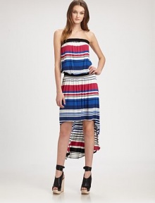 Boldly striped strapless silhouette has a touch of stretch and flirty hi-low hem. StraplessElasticized drop waistAsymmetrical hi-low hemAbout 19 from natural waist at the highest pointAbout 24 from natural waist at the lowest point96% rayon/4% spandexHand washMade in USAModel shown is 5'10 (177cm) wearing US size Small. Boldly striped strapless silhouette has a touch of stretch and flirty hi-low hem. StraplessElasticized drop waistAsymmetrical hi-low hemAbout 19 from natural waist at the highest pointAbout 24 from natural waist at the lowest point96% rayon/4% spandexHand washMade in USAModel shown is 5'10 (177cm) wearing US size Small.