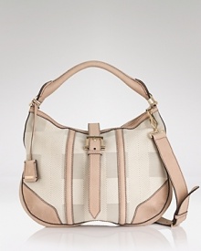 Burberry's leather-trimmed hobo is office perfect. A muted palette ensures it complements all your workday favorites. Burberry's leather-trimmed hobo is office perfect. A muted palette ensures it complements all your workday favorites.