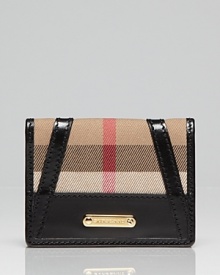 Less is more: Burberry's sized-right card case is a practical piece with major fashion credentials. Less is more: Burberry's sized-right card case is a practical piece with major fashion credentials.