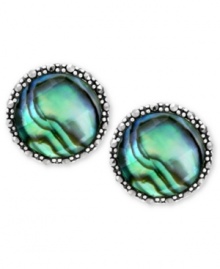Inspire your look with ocean color. Genevieve & Grace's pretty stud earrings feature round-cut abalone glass and glittering marcasite. Set in sterling silver. Approximate diameter: 5/8 inch. Inspire your look with ocean color. Genevieve & Grace's pretty stud earrings feature round-cut abalone glass and glittering marcasite. Set in sterling silver. Approximate diameter: 5/8 inch.
