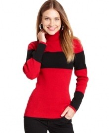 Style&co.'s ribbed turtleneck features a bold printed stripe at the sleeves and chest, a figure-flattering fit and versatile style. Pair with anything from jeans to pencil skirts!