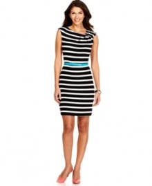 A black and white stripe gets a bold boost from a bright removable belt on Calvin Klein's latest dress. The asymmetrical neckline adds another contemporary touch. A black and white stripe gets a bold boost from a bright removable belt on Calvin Klein's latest dress. The asymmetrical neckline adds another contemporary touch.
