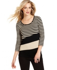 This top from Cable & Gauge makes a bold statement with classic stripes and colorblocking at the hem. Pair it with skinny pants for a no-fuss ensemble.