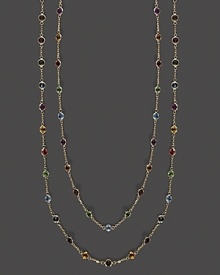 A brilliant medley of faceted semi-precious stones set in a long, luxe 14K yellow gold necklace