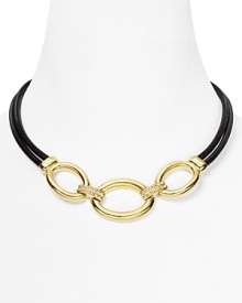 T Tahari makes a mixed material statement with this gold-plate and leather necklace, boasting a bold contrast of tone and texture. T Tahari makes a mixed material statement with this gold-plate and leather necklace, boasting a bold contrast of tone and texture.