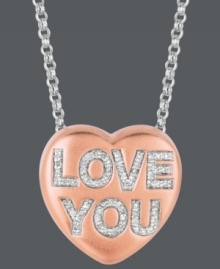 Add a little romance to the moment. Give her the gift of Sweethearts' stunning pendant. Crafted in 14k rose gold over sterling silver, this heart-shaped design features the words LOVE YOU in round-cut diamonds (1/6 ct. t.w.). Copyright © 2011 New England Confectionery Company. Approximate length: 16 inches + 2-inch extender. Approximate drop: 5/8 inch. Add a little romance to the moment. Give her the gift of Sweethearts' stunning pendant. Crafted in 14k rose gold over sterling silver, this heart-shaped design features the words LOVE YOU in round-cut diamonds (1/6 ct. t.w.). Copyright © 2011 New England Confectionery Company. Approximate length: 16 inches + 2-inch extender. Approximate drop: 5/8 inch.