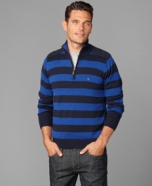 Big bold stripes set this Tommy Hilfiger sweater apart from others in your lineup.