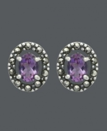 Button up your look in rich and regal hues. Genevieve & Grace stud earrings feature beautiful, oval-cut amethyst gemstones (1-1/3 ct. t.w.) encircled by glittering marcasite. Crafted in sterling silver. Approximate diameter: 1/2 inch. Button up your look in rich and regal hues. Genevieve & Grace stud earrings feature beautiful, oval-cut amethyst gemstones (1-1/3 ct. t.w.) encircled by glittering marcasite. Crafted in sterling silver. Approximate diameter: 1/2 inch.