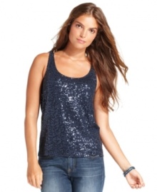 Add sparkle to day or night in this sequin tank top by Calvin Klein Jeans. It looks as chic with jeans as it does dressed up!