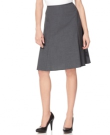 Calvin Klein's sleek A-line skirt always makes the right impression. Pair it with a fitted jacket and a silk blouse to complete the look. Calvin Klein's sleek A-line skirt always makes the right impression. Pair it with a fitted jacket and a silk blouse to complete the look.