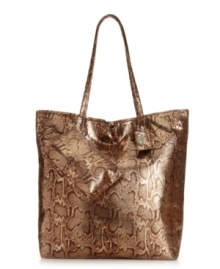 Go bold with this stunning snakeskin print style from Carlos by Carlos Santana. An all-over print covers this oversized tote design for the perfect combination of fashion and function. Go bold with this stunning snakeskin print style from Carlos by Carlos Santana. An all-over print covers this oversized tote design for the perfect combination of fashion and function.