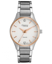 Two sparkling diamond accents blend with rosy tones on this modern watch from Caravelle by Bulova.