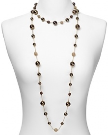 Embellished with delicate pearl and crystal stations, Carolee's illusion necklace sparkles with versatility -- elegant whether worn to dress up denim or enliven a classic white blouse. Embellished with delicate pearl and crystal stations, Carolee's illusion necklace sparkles with versatility -- elegant whether worn to dress up denim or enliven a classic white blouse.