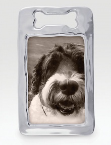 A fitting display for a photo of your best friend, hand-crafted of recycled aluminum.Accommodates a 4 X 6 photoRecycled aluminum4.75W X 5.75HWipe cleanImported