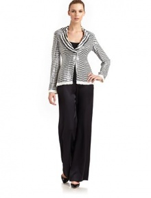 THE LOOKAllover sequin designSemi-sheer constructionPadded shouldersNotched lapelSlightly asymmetrical snap closureLong sleevesTHE FITAbout 23 from shoulder to hemTHE MATERIALSilkSilk liningCARE & ORIGINDry cleanMade in ItalyModel shown is 5'10½ (179cm) wearing US size 4. THE LOOKAllover sequin designSemi-sheer constructionPadded shouldersNotched lapelSlightly asymmetrical snap closureLong sleevesTHE FITAbout 23 from shoulder to hemTHE MATERIALSilkSilk liningCARE & ORIGINDry cleanMade in ItalyModel shown is 5'10½ (179cm) wearing US size 4.