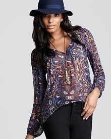 Aqua's breezy blouse in a pretty paisley print brings statement style to your off-duty looks. Aqua's breezy blouse in a pretty paisley print brings statement style to your off-duty looks.
