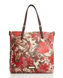 This prettily eye-popping shopper features a 60s-inspired floral print to put a happy spin on everyday errands. This prettily eye-popping shopper features a 60s-inspired floral print to put a happy spin on everyday errands.