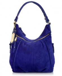 Laid-back with a little luxe, this lovely leather hobo by Tignanello is adorned with golden hardware and delicate detail stitching. Plenty of pockets inside and out add practicality, for a style that'll take you from deskside to after dinner drinks. Laid-back with a little luxe, this lovely leather hobo by Tignanello is adorned with golden hardware and delicate detail stitching. Plenty of pockets inside and out add practicality, for a style that'll take you from deskside to after dinner drinks.